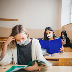 PPE products for schools including face masks, sanitizer dispensers, floor decals, and more