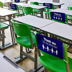 Social distancing desk covers offer visual reminders to students